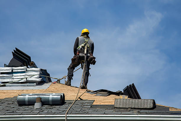 Professional Gutter Installation technician working in Ayer, MA